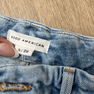 Good American light wash, split hem denim